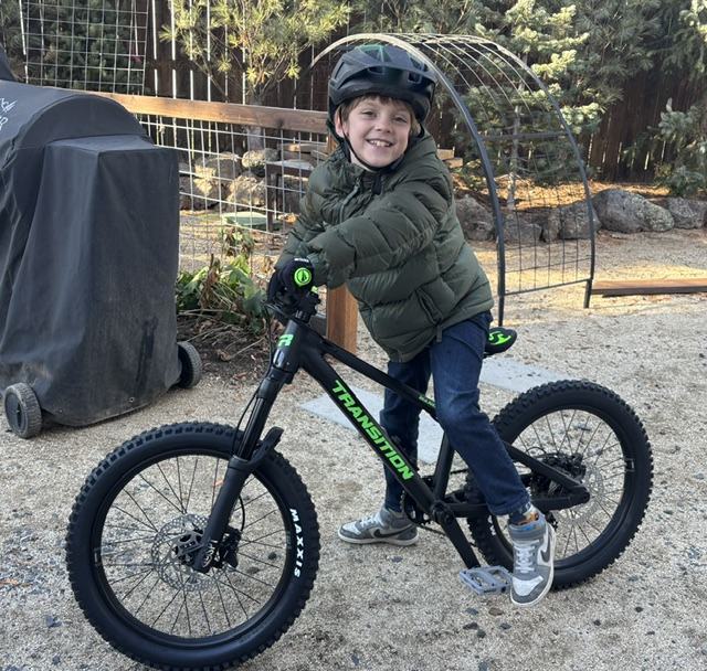 Charles's son Felix on his mountain bike